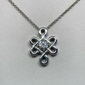 Sterling Silver Infinity Knot Pendant Necklace with Moissanite Space Rock center